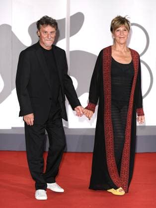 Venice, 80th Venice Film Festival 2023 - Evening 5 - red carpet Filming Italy. In the photo Giorgio Tirabassi with his wife  Copyright: xManuelexMangiarottix xipa-agencyx xPoolxPhotoxEventsx02x IPA_IPA40047519