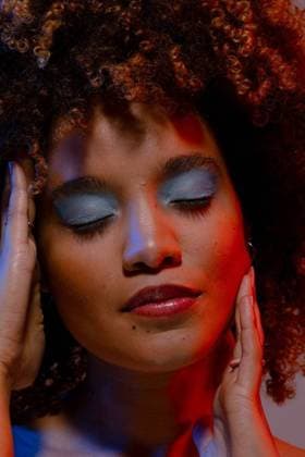 Biracial woman in blue eye shadow touching face with eyes closed in blue and red light Biracial woman in blue eye shadow touching face with eyes closed in blue and red light. Femininity, face, facial expressions, body, skin and beauty, unaltered., model released, , property released, Cape Town, South Africa, 2023-07-25T22:00:00.000Z, 4160392.jpg, people,beauty,biracial woman,blue,eye,shadow,touching,face,eyes closed,red light,femininity,facial expression,body,skin,unaltered,beautiful,portrait,young,model,attractive,hair,care,makeup,fashion,pretty,adult,person,health,spa,cosmetic,nature,white,sexy,glamour,lady,biracial,woman,red,light,facial,expression Young Adult,Woman,Female,Multiracial