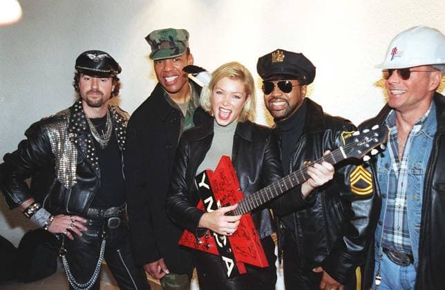 NELL McANDREW British Model and TV Personality (with guitar) Pictured with THE VILLAGE PEOPLE 1970 s American Pop Group Seen at the launch for the re-release of one of The Village People s biggest hits YMCA , royalties from which will be donated t NELL McANDREW British Model and TV Personality (with guitar) Pictured with THE VILLAGE PEOPLE 1970 s American Pop Group Seen at the launch for the re-release of one of The Village People s biggest hits YMCA , royalties from which will be donated to a YMCA charity. COMPULSORY CREDIT: Starstock Photoshot Photo UHY 016838 C-27a 22.11.1999, Credit:Photoshot Avalon United Kingdom  Copyright: xPhotoshotx xAvalonx 0506401524