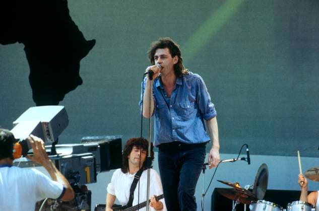LIVE AID - Bob Geldof - Lead singer of the irish punk rock band The Boom Town Rats . Organiser of the charity concert Live Aid - 13th July, Wembley Stadium. Performing on stage. Date: 13.07.1985., Credit:Photoshot Avalon United Kingdom, London  Copyright: xPhotoshotx xAvalonx 0506570413
