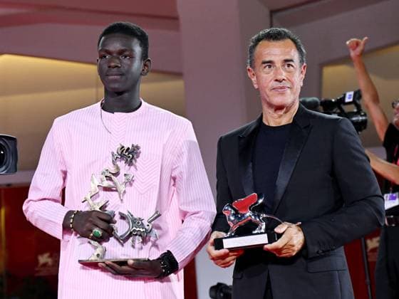 Venice, 80th Venice Film Festival 2023 - evening 11. Red Carpet Awardees In the photo: Seydou Sarr and Matteo Garrone  Copyright: xManuelexMangiarottix xipa-agencyx xPoolxPhotoxEventsx02x IPA_IPA40180484