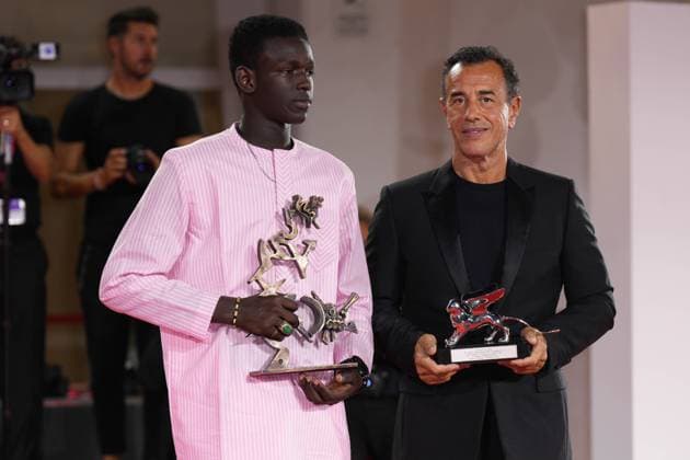 IPP Photo Daniele Cifala™ Venice 09 09 2023 Winners Photocall The 80th Venice International Film Festival in the photo Seydou Sarr winner of the Mastroianni award for young emerging actor with director Matteo Garrone winner of the Silver Lion for Best Director Italy Photo Press World Copyright  0