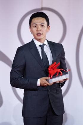 Venice Winners Red Carpet Lee Hong-Chi poses with the Lion of the Future - Luigi De Laurentiis Award for a Debut Film for film Love Is A Gun during the Winners Red Carpet as part of the 80th Venice Film Festival (Mostra) in Venice, Italy on September 09, 2023. Photo by Aurore Marechal ABACAPRESS.COM Venice Italy  Copyright: xMarechalxAurore ABACAx 867017_011 MarechalxAurore ABACAx 867017_011