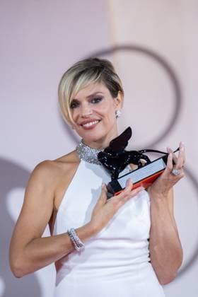 Venice Winners Red Carpet Micaela Ramazzotti poses with the Armani Beauty Audience Award for Felicita (Happiness) during the Winners Red Carpet as part of the 80th Venice Film Festival (Mostra) in Venice, Italy on September 09, 2023. Photo by Aurore Marechal ABACAPRESS.COM Venice Italy  Copyright: xMarechalxAurore ABACAx 867017_086 MarechalxAurore ABACAx 867017_086