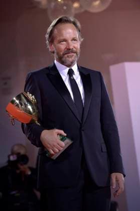 Peter Sarsgaard poses with the Coppa Volpi for Best Actor for the movie Memory during the winner s photocall at the 80th Venice International Film Festival on Saturday, September 9, 2023 in Venice, Italy.  VEN2023090963 RoccoxSpaziani
