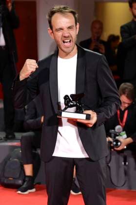 Erenik Beqiri with the award for the best short film A Short Trip at the photocall with the winners of the Biennale di Venezia 2023 80 Venice International Film Festival at Palazzo del Casino Venice, 09 09 2023. Foto:xA.xM.xTinghinox xFuturexImagex preistraeger_3922