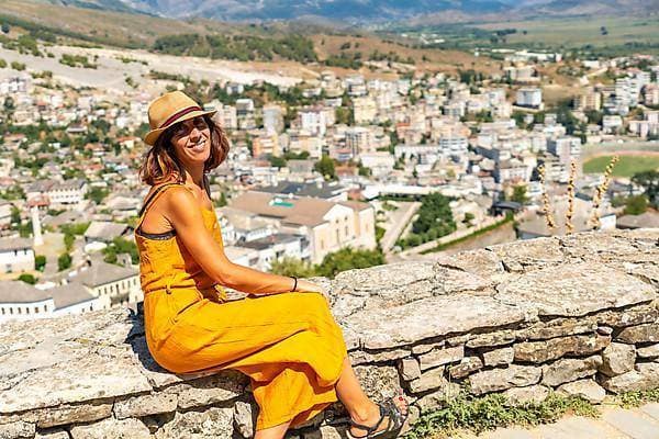 a Tourist looks from the Ottoman Fortress from Gjirokaster Or Gjirokastra at the City Albanian Copyright: imageBROKER/UnaixHuizi ibxuhu09606142.jpg ,model released, Symbolfoto ,property released