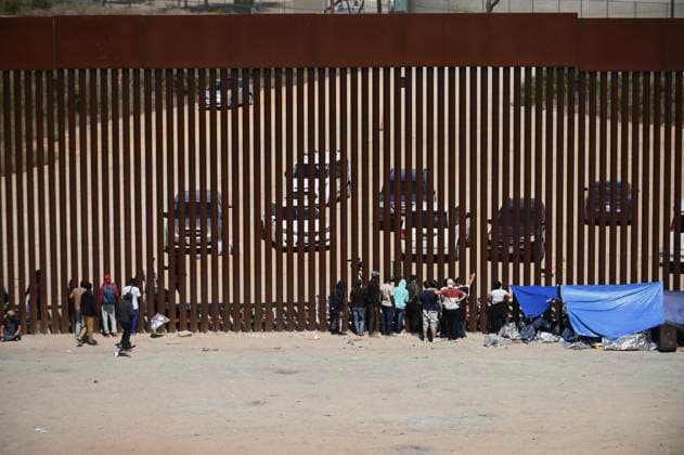 September 12, 2023, Tijuana, Baja California, Mexico: Around a hundred people are stuck between the two US-Mexico border fences dividing Tijuana and San Diego on Tuesday, September 12, 2023, as viewed from Tijuana, Mexico. US officials along the border with Mexico processed 183,000 plus migrants this July, as illegal crossings jumped by 33 percent after dropping to a two-year low in June, a month after the Title 42 migrant policy rescinded on May 12, despite record high heat levels, according to government statistics. Tijuana Mexico - ZUMAm180 20230912_zip_m180_004 Copyright: xCarlosxA.xMorenox