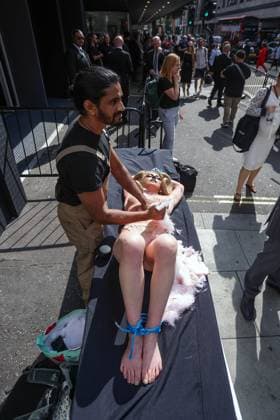 . 15 09 2023. London, United Kingdom. PETA Protest London Fashion Week Over Cashmere Garments. PETA supporters hold a goat combing outside the British Fashion Council s (BFC) NEWGEN Show Space to demonstrate what happens in the industry. A worker will pin down a screaming and nearly nude PETA supporter dressed as a goat and tear their hair out with a giant silver comb, leaving them with bloody wounds.  xMartynxWheatleyx xi-Imagesx IIM-24676-0005