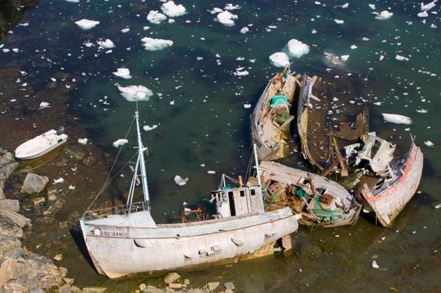 Wrecked boats abandoned Wrecked boats abandoned on the coast near Ilulissat on Greenland July 2008., Credit:Ashley Cooper Avalon  Copyright: xAshleyxCooperx xAvalonx 0507255519