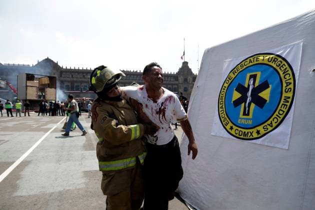 September 19, 2023, Mexico City, Mexico: On National Civil Protection Day; Rescue teams from the Armed Forces, Mexican Army, USAR and public security participate in the Second National Drill in an earthquake scenario with fires and collapsed structures in the Zocalo in Mexico City. on September 19, 2023 in Mexico City, Mexico Mexico City Mexico - ZUMAe321 20230919_zia_e321_036 Copyright: xLuisxBarronx