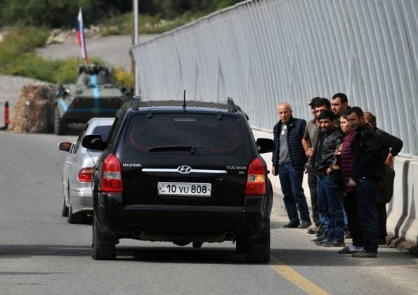 Azerbaijan Armenia Tensions Evacuees 8525195 26.09.2023 Refugees from Nagorno-Karabakh are seen at the Lachin checkpoint at the entrance to the Lachin Corridor, the only road leading from the breakaway region of Nagorno-Karabakh to Armenia, in Azerbaijan. The number of people fleeing Nagorno-Karabakh for Armenia after Azerbaijan launched a military operation in the region has risen to 28,120, the Armenian government said on September 26. Mikhail Voskresenskiy Sputnik Azerbaijan  Copyright: xMikhailxVoskresenskiyx