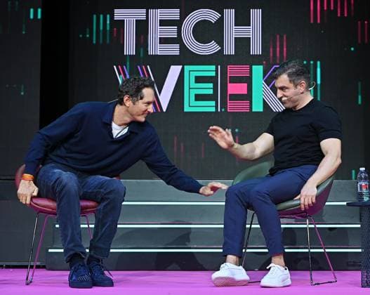 September 28, 2023, Turin: John Elkann (L), CEO Exor and Chairman Stellantis and Ferrari, talks with Brian Chesky (R) Co-Founder and CEO Airbnb during Italian Tech Week, in Turin, Italy, 28 September 2023. ANSA ALESSANDRO DI MARCO Turin  - ZUMAa110 20230928_zaf_a110_022 Copyright: xAlessandroxDixMarcox