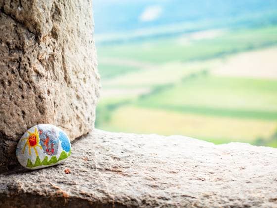 The picture painted on a stone is part of a children s tourist game. Devicky castle ruin, Czechia. 29th of August 2021. The picture painted on a stone is part of a children s tourist game. Devicky ruin window, Pavlov region. South Moravia, Czechia Copyright: xZoonar.com rdonarx 17564966