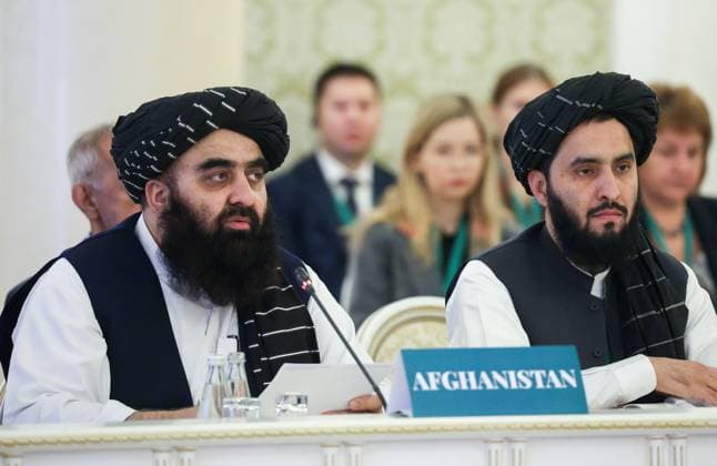 RUSSIA, KAZAN - SEPTEMBER 29, 2023: Amir Khan Muttaqi, minister of foreign affairs in Afghanistan s interim government formed by the Taliban (banned in Russia), left, attends the 5th meeting of Moscow format consultations on Afghanistan at the Kazan City Hall. Yegor Aleyev TASS  62776061