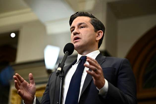 October 3, 2023, Ottawa, ON, CAN: Conservative Leader Pierre Poilievre speaks to reporters in the Foyer of the House of Commons on Parliament Hill in Ottawa, on Tuesday, Oct. 3, 2023. Ottawa CAN  - ZUMAc35_ 20231003_zaf_c35_019 Copyright: xJustinxTangx