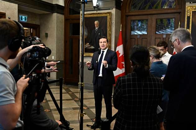 October 3, 2023, Ottawa, ON, CAN: Conservative Leader Pierre Poilievre speaks to reporters in the Foyer of the House of Commons on Parliament Hill in Ottawa, on Tuesday, Oct. 3, 2023. Ottawa CAN  - ZUMAc35_ 20231003_zaf_c35_022 Copyright: xJustinxTangx