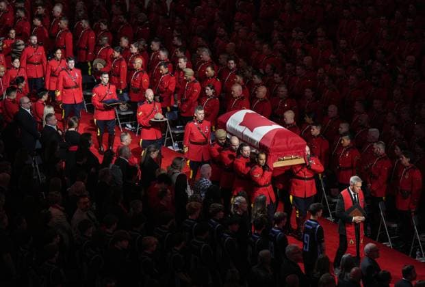 October 4, 2023, LANGLEY, BC, CANADA: Pallbearers carry RCMP Const. Rick O Brien s casket into a regimental funeral in Langley, B.C., on Wednesday, October 4, 2023. O Brien, 51, was killed last month while executing a search warrant at a home in Coquitlam. LANGLEY CANADA - ZUMAc35_ 20231004_zaf_c35_077 Copyright: xDarrylxDyckx