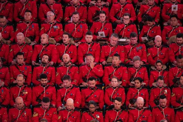 News Bilder des Tages October 4, 2023, LANGLEY, BC, CANADA: RCMP officers listen during a regimental funeral for RCMP Const. Rick O Brien in Langley, B.C., on Wednesday, October 4, 2023. O Brien, 51, was killed last month while executing a search warrant at a home in Coquitlam. LANGLEY CANADA - ZUMAc35_ 20231004_zaf_c35_082 Copyright: xDarrylxDyckx