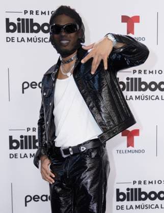 Myke Towers arrives on the red carpet at the 2023 Latin Billboard Music Awards at the University of Miami, Watsco Center, Thursday, October 05, 2023 in Coral Gables, Florida.  MIA20231005124 GARYxIxROTHSTEIN