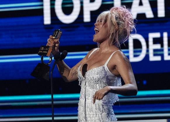 Karol G receives an award at the 2023 Latin Billboard Music Awards at the University of Miami, Watsco Center, Thursday, October 05, 2023 in Coral Gables, Florida.  MIA20231005168 GARYxIxROTHSTEIN