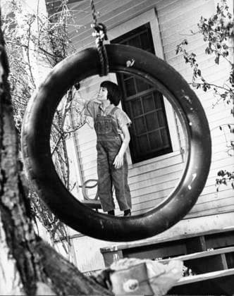 Film To Kill A Mockingbird Actress Mary Badham in a scene of the film Monroeville, Alabama USA  Copyright: xLeoxFuchsx 0804 Mary Badham (To Kill A Mockingbird) THROUGH TIRE SET