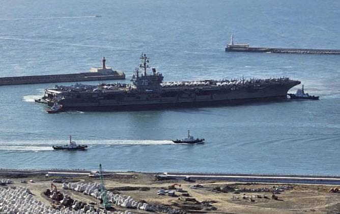 Bilder des Jahres 2023, News 10 Oktober News Themen der Woche KW41 U.S. aircraft carrier arrives in S. Korea U.S. nuclear-powered aircraft carrier Ronald Reagan docks at the South Korean port of Busan on Oct. 12, 2023, amid rising tensions with North Korea.  A14AA0002008796P