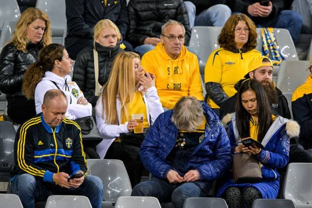 BRUSSELS - Swedish fans after the European Championship qualifier Belgium - Sweden. The football match was stopped at halftime due to the shooting earlier in the day in the center of Brussels that left two Swedish people dead. ANP netherlands out - belgium out  Copyright: xx x481297724x originalFilename: 481297724.jpg
