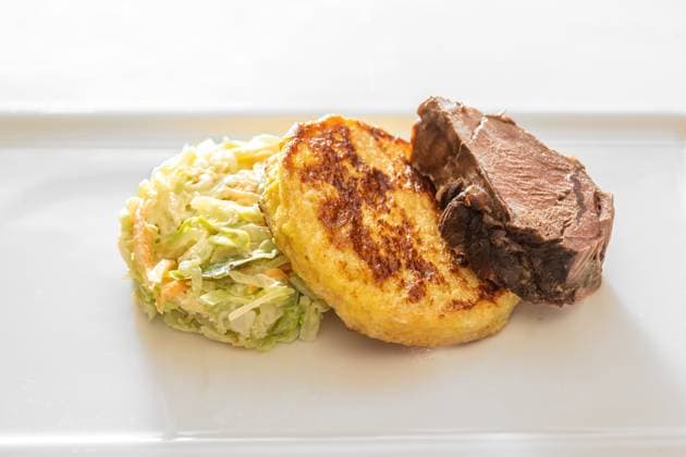 Roast deer, flat bread dumpling and round shaped vegetables, gourmet dish on a white plate, copy space, selected focus Roast deer, flat bread dumpling and round shaped vegetables, gourmet dish on a white plate, copy space, selected focus, narrow depth of field Copyright: xZoonar.com MARENxWINTERx 20564792
