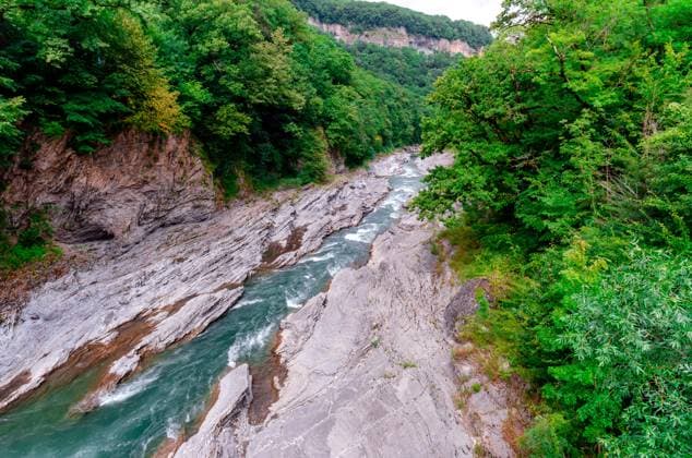 Creative Highlights World landscape mountain river and rocks with green tropical plants in thailand landscape mountain river and rocks with green fresh plants in thailand Copyright: xZoonar.com SofiiaxPotaninax 20593990