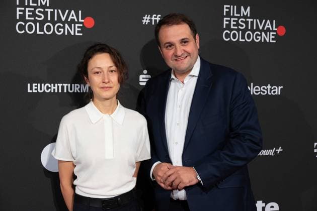 v l Katharina HUBER, filmmaker, director, Nathanael LIMINSKI, head of the state chancellery NRW, red carpet, red carpet show, arrival, arrival, Film Festival Cologne awards in Koeln, 26 10 2022