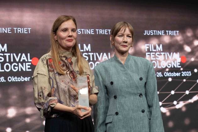 f l director Justine TRIET, actress Sandra HUELLER, Hüller, director Justine TRIET receives the Film Award Cologne, Film Festival Cologne awards in Cologne, 26 10 2022