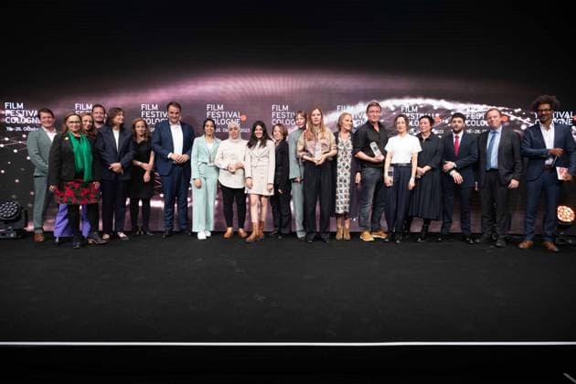Closing photo with all award winners and laudators, Film Festival Cologne awards in Cologne, 26 10 2022