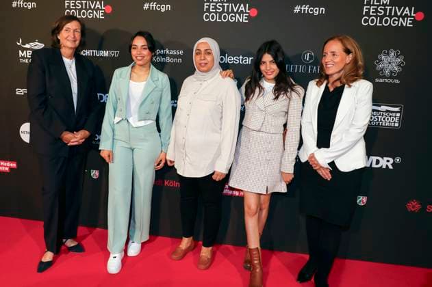 Olfa Hamrouni with her daughters Eya and Tayssir at the Cologne Awards ceremony at the 33 Film Festival Cologne 2023 at E Werk Cologne, 26 10 2023. Foto:xR.xSchmiegeltx xFuturexImagex cologne_awards_3035