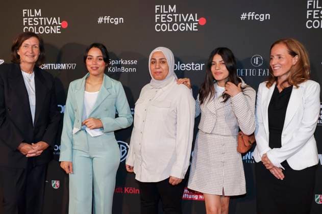 Olfa Hamrouni with her daughters Eya and Tayssir at the Cologne Awards ceremony at the 33 Film Festival Cologne 2023 at E Werk Cologne, 26 10 2023. Foto:xR.xSchmiegeltx xFuturexImagex cologne_awards_3036
