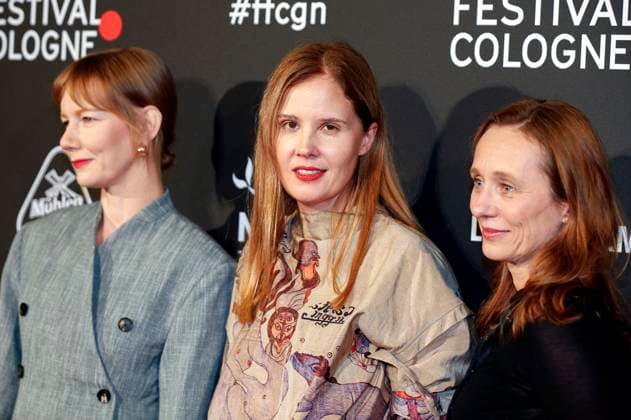 Sandra Hüller, Justine Triet and guest at the Cologne Awards ceremony at the 33 Film Festival Cologne 2023 at E Werk Cologne, 26 10 2023. Foto:xR.xSchmiegeltx xFuturexImagex cologne_awards_3097