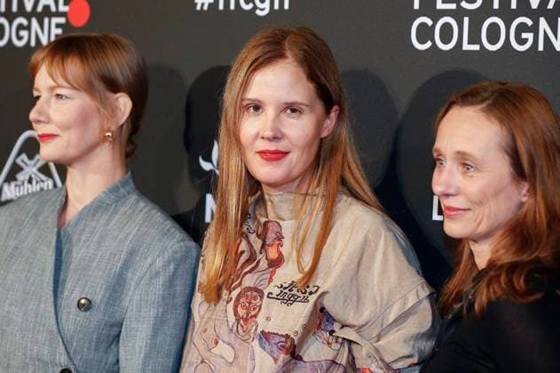 Sandra Hüller, Justine Triet and guest at the Cologne Awards ceremony at the 33 Film Festival Cologne 2023 at E Werk Cologne, 26 10 2023. Foto:xR.xSchmiegeltx xFuturexImagex cologne_awards_3098