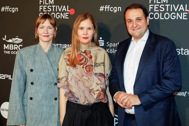Sandra Hüller, Justine Triet and Nathanael Liminski at the Cologne Awards ceremony at the 33 Film Festival Cologne 2023 at E Werk Cologne, 26 10 2023 Foto:xR.xSchmiegeltx xFuturexImagex cologne_awards_3099