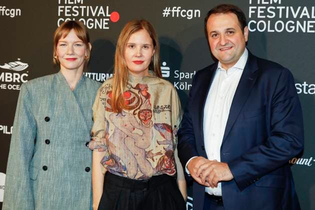 Sandra Hüller, Justine Triet and Nathanael Liminski at the Cologne Awards ceremony at the 33 Film Festival Cologne 2023 at E Werk Cologne, 26 10 2023 Foto:xR.xSchmiegeltx xFuturexImagex cologne_awards_3100