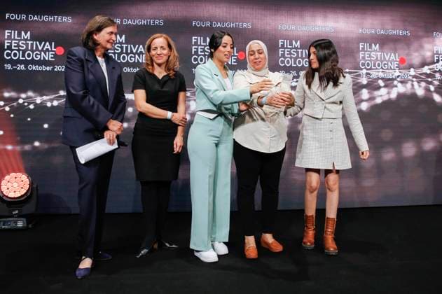 Olfa Hamrouni with her daughters Eya and Tayssir at the Cologne Awards ceremony at the 33 Film Festival Cologne 2023 at E Werk Cologne, 26 10 2023. Foto:xR.xSchmiegeltx xFuturexImagex cologne_awards_3184