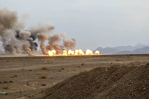 October 28, 2023, Nasr Abad, Isfahan, Iran: Fireballs erupt during a ground force drill. Amid rising tension in the Middle East due to the ongoing Israel-Hamas conflict, the Iranian army announced on 27 October the beginning of a massive military exercise in the central region of the country to assess combat capabilities and test new weaponry. Nasr Abad Iran - ZUMAi98_ 20231028_zih_i98_019 Copyright: xIranianxArmyxOfficex
