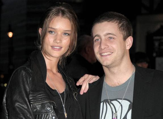 Rosie Huntington Whiteley and Tyrone Wood at the Shine A Light film premiere at Odeon cinema 20957, LONDON, UNITED KINGDOM, Wednesday, April 4, 2008, UK, IRELAND, DUBAI, USA AND CANADIAN USE ONLY: Rosie Huntington Whiteley and Tyrone Wood at the Shine A Light film premiere at Odeon cinema. Shine a Light is a career-spanning documentary on the Rolling Stones, with concert footage from their A Bigger Bang tour. Photograph: PacificCoastNews.com UK OFFICE: +44 131 225 3333 3322 US OFFICE: 1 310 261 9676, Credit:PacificCoastNews.com Avalon United Kingdom Copyright: xPacificCoastNews.comx xAvalonx 0524060482