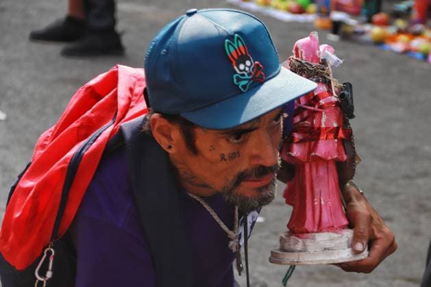 October 31, 2023 in Mexico City, Mexico: Hundreds of devotees of the Santa Muerte also known as White Girl visit the altar located at Morelos colony, to celebrate the 22nd anniversary of its founding, in the brave neighborhood of Tepito. On October 31, 2023. In Mexico City. Mexico City Mexico - ZUMAe321 20231031_zia_e321_015 Copyright: xCarlosxSantiagox