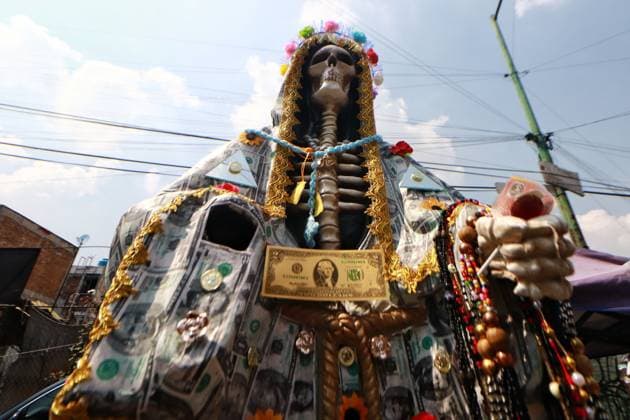 October 31, 2023 in Mexico City, Mexico: Hundreds of devotees of the Santa Muerte also known as White Girl visit the altar located at Morelos colony, to celebrate the 22nd anniversary of its founding, in the brave neighborhood of Tepito. On October 31, 2023. In Mexico City. Mexico City Mexico - ZUMAe321 20231031_zia_e321_027 Copyright: xCarlosxSantiagox
