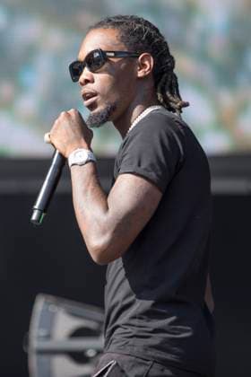Migos performs at Leeds Festival 2017 Offset (Kiari Kendrell Cephus) performs with Migos at Leeds Festival 2017, Bramham Park, Leeds, 27th August 2017., Credit:Mike Gray Avalon  Copyright: xMikexGrayx xAvalonx 0512361617