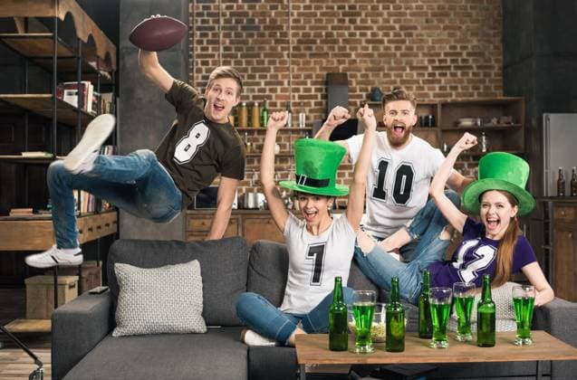 Excited young friends watching football match at st patricks day, model released, , 23723000.jpg, celebration, festive, happy, holiday, celebrate, adult, people, women, cheering, caucasian, friendship, men, traditional, jumping, emotional, togetherness, friends, indoors, bottles, alcohol, watching, glasses, casual, excited, gesturing, tv, fans, irish, front view, rugby ball, green beer, saint patrick, st patricks day concept, Irish hats, RECORD DATE NOT STATED