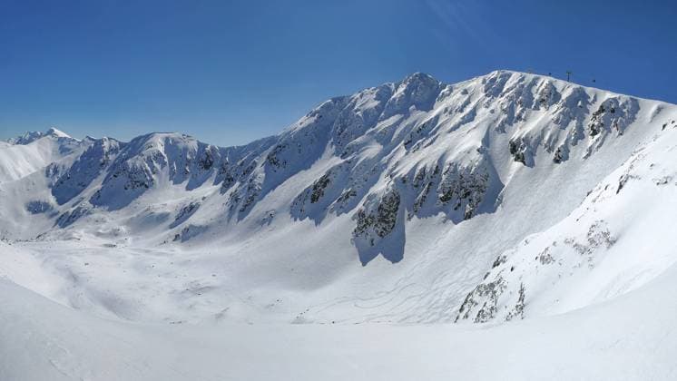 Panorama of Low Tatras with Mount Chopok peak on a sunny winter day. , 33604988.jpg, high, alpine, alps, peak, wide, skiers, ski, piste, sky, sunny, snow, cold, winter, mountain, slovakia, panorama, nature, white, blue, landscape, travel, resort, top, tourism, europe, sport, scenic, panoramic, ice, background, heaven, beautiful, gorgeous, snowboard, hill, ridge, cloud, range, holiday, environment, trekking, extreme, summit, low, hiking, cloudscape, paradise RECORD DATE NOT STATED