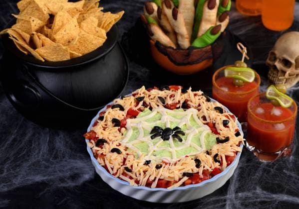 Spooky Halloween Seven Layer Taco Dip: Turn a classic appetizer into a Halloween with of black olive spider . , 36086036.jpg, Witches, fingers, corn, chips, tacos, mexico, day of the dead, cheese, guacamole, dip, salsa, Michelada, idea, Halloween, snack, food, bloody Mary, olives, avocado, appetizer, bites, celebratory, festive, holiday, feast, party, luncheon, lunch, elevenses, brunch, dinner, portion, delicacy, concept, homemade, Yummy, Edible, improvisation, Fingerfood, stand-up meal, decor, Smorgasbord, Banquet, Buffet, helve, piquant, regale, treat, tortilla, trick RECORD DATE NOT STATED