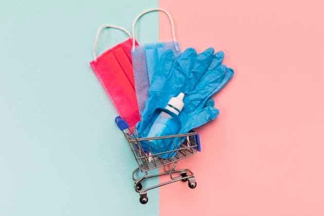 Top view Kleiner Shopping Cart with medical Masks Copyright: imageBROKER/OleksandrxLatkun iblole09802165.jpg