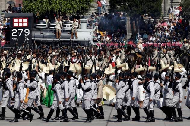 Andres Manuel Lopez Obrador, president of Mexico commemorates the 113th anniversary of the Mexican Revolution November 20, 2023, Mexico City, Mexico: Military personnel participate in costumes in the representations of scenes from the Mexican Revolution in the Zocalo square in Mexico City. on November 20, 2023 in Mexico City, Mexico (Photo by Luis Barron Eyepix Group). Copyright: xLuisxBarronx xEyepixxGroupx LB_20231120_REVMEX29